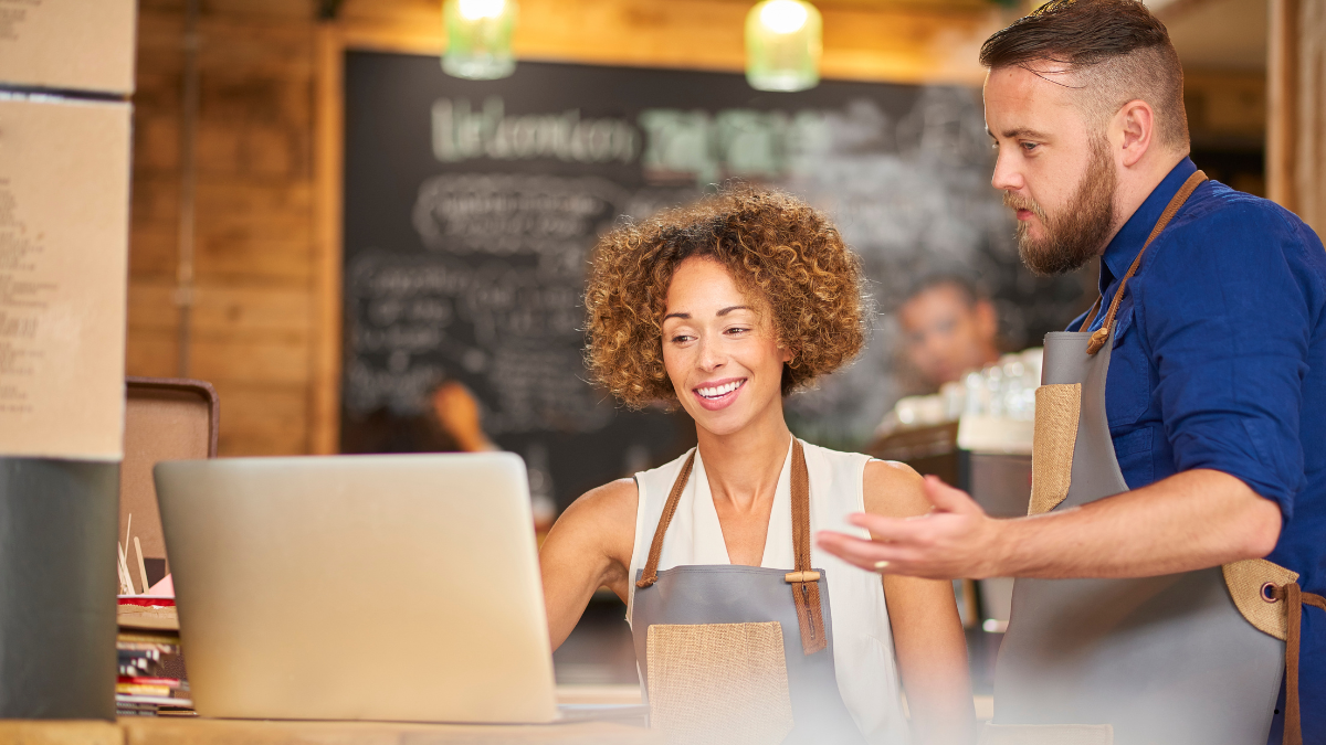 Small business owner working through a pre-October 2026 payment review checklist at their desk